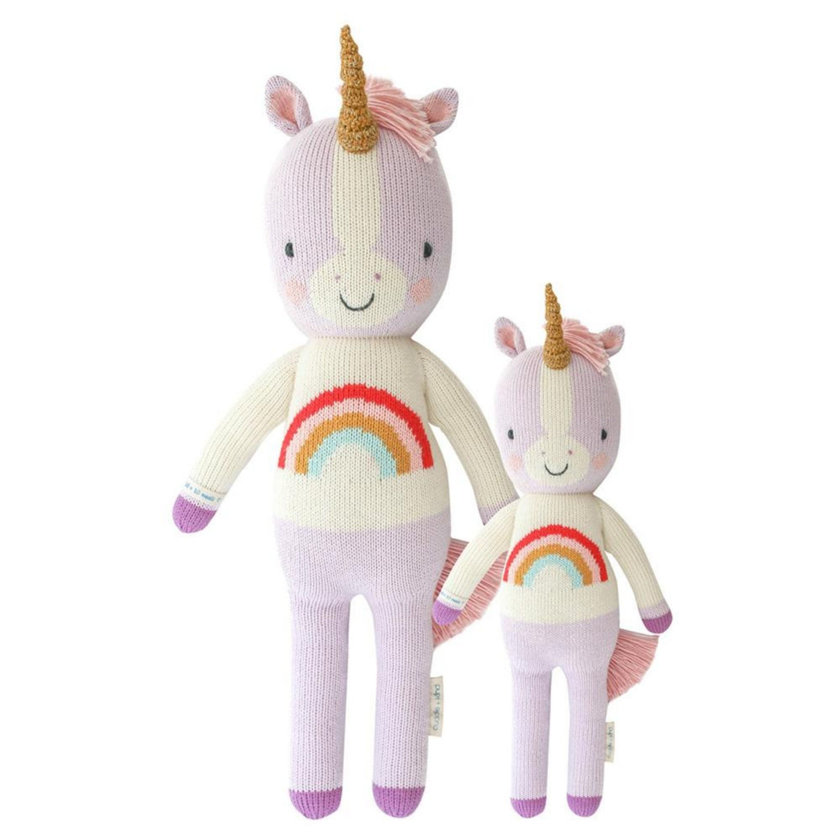 Two unicorn plush toys with rainbow designs on a white background