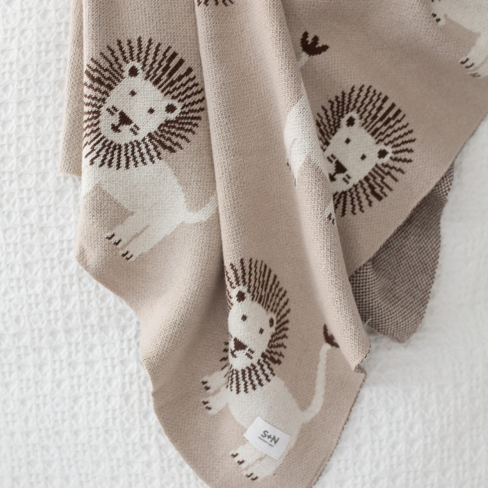 Cozy Knit Baby Blanket - Lion March