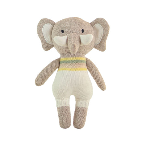 Knitted toy elephant with a striped sweater on a white background
