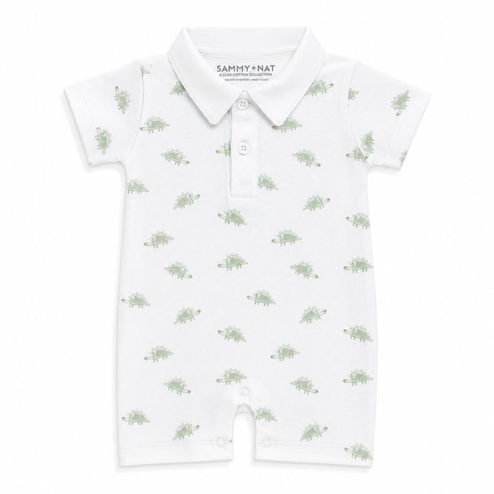 White baby romper with green pattern and 'Sammy & Nat' branding on a white background in pima summer romper