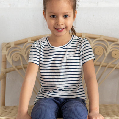 girl wearing navy stripe shirt